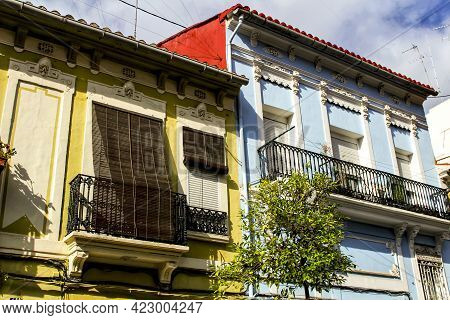 Colorful Facades Of Old Buildings In The Cabanyal Neighborhood In Valencia, Spain