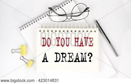 Do You Have A Dream Question On Notebook With Pen,clips And Glasses