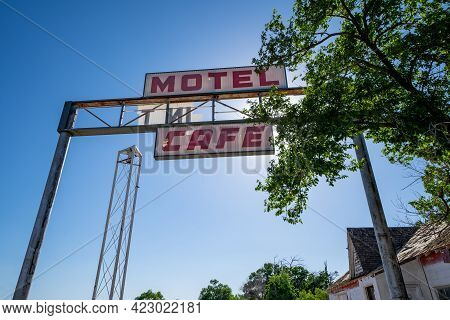 Glenrio, Texas - May 6, 2021: Abandoned Sign For The Former First Last Motel In Texas In The Route 6