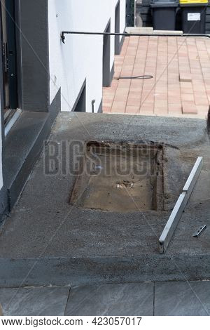 The Construction Worker Evenly Spreads The Surface Of The Stairs With Cement Adhesive Mass Using A S