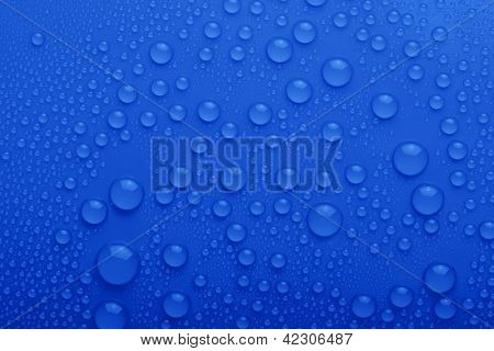 Water Drops On Blue Background