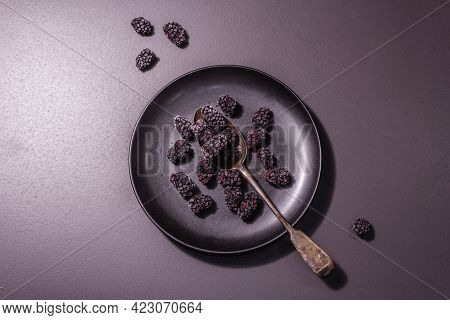Blackberries On A Ceramic Plate, Frozen Fruits For A Healthy Food Diet