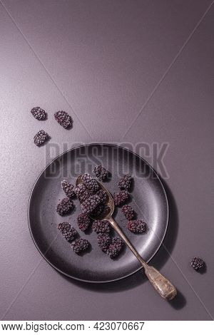 Blackberries On A Ceramic Plate, Frozen Fruits For A Healthy Food Diet