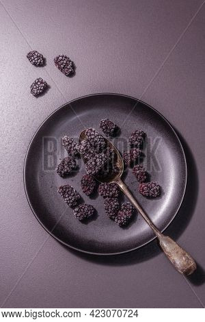 Blackberries On A Ceramic Plate, Frozen Fruits For A Healthy Food Diet