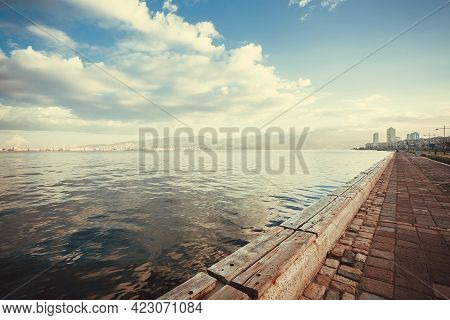 Sunrise Over The Waterfront In A Turkish City Izmir With Hills And Historic Streets. Landscape Under