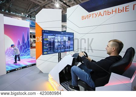 Minsk. Belarus - 05.31.2021 - A Man Plays A Video Game At The Tibo Exhibition In Minsk, Belarus. Hig