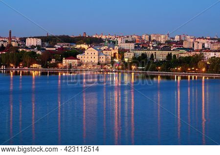 Ternopil, Ukraine-may, 11,2021:aerial View Of Night Lights Landscape Of Ternopil Downtown. City Lake