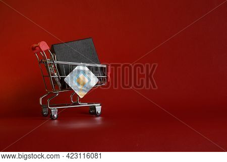 Supermarket Trolley With Black Box And Rfid Tag Transponder. The Concept Of Using Rfid Technology In