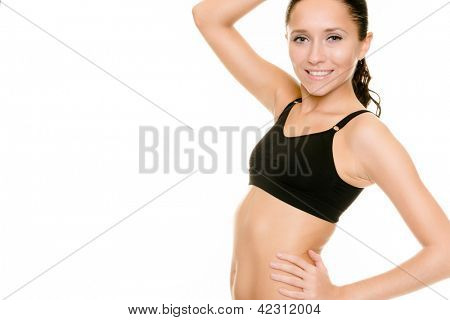 Donna sportiva in stuido davanti a sfondo bianco