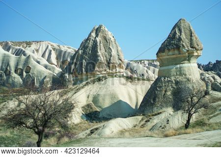 Amazing Cappadocia Landscape With And Caves In Mountains. Adventure In Turkey Tourist Destination Ca