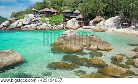 A Large Pool Of Water In Front Of A Rock Indonesia Bali. A Large Pool Of Water In Front Of A Rock. H