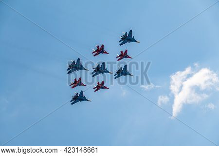 Moscow, Russia - May, 05, 2021: Diamond-shape Of 4 Mig-29 The Russian Knights And 5 Su-27 Swifts In 