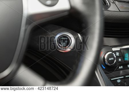 Novosibirsk, Russia - June 08, 2021: Ford Kuga, Car Dashboard:  Black Engine Start Stop Button, Car 