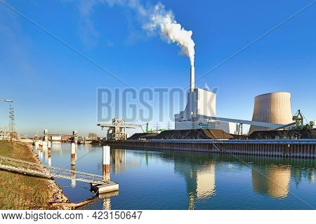 Steam Power Plant At Rhine River In Karlsruhe In Germany Used For Generation Of Electricity And Dist