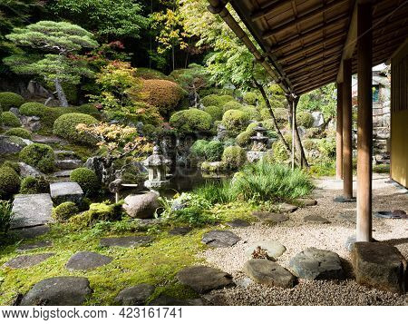 Kiso, Nagano Prefecture, Japan - October 23, 2017: Traditional Japanese Landscape Garden With Pond A