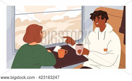 Couple Of Passengers Traveling By Railroad, Sitting By Window With Tea Cups And Talking In Train. Ha