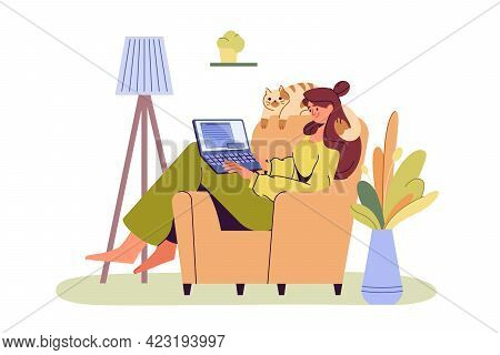 Happy Girl With Laptop Sitting On Armchair. Young Woman Working Or Studying On A Computer. Cozy Home