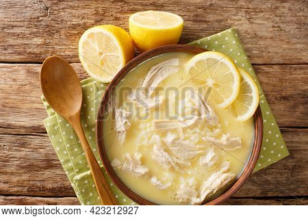 Chicken Soup With Eggs And Lemon Kotosoupa Avgolemono Close Up In The Plate On The Table. Horizontal