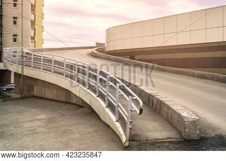 The Road To The Second Floor Of The Parking Lot Meanders.