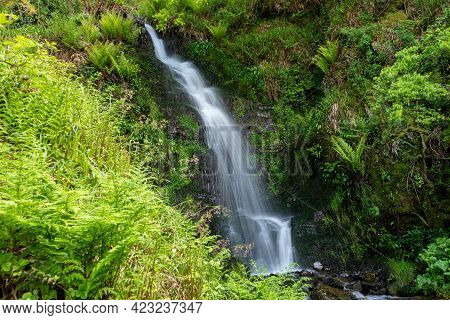 Long Exposure Of The Hollowbrook Waterfall On The South West Coastpath From Woody Bay To Heddons Mou
