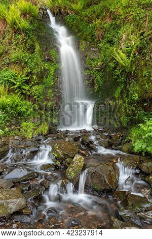 Long Exposure Of The Hollowbrook Waterfall On The South West Coastpath From Woody Bay To Heddons Mou