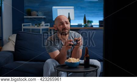 Angry Disappointed Man Losing Video Game Playing With Joystick, Wirelles Joypad. Sad Nervous Home Al