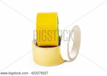 Studio Lighting. The Background Is White. Yellow Scotch Tape. Close-up