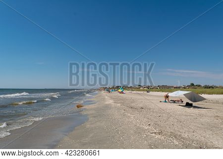 Corbu, Constanta, Romania - August 01, 2020: Tourist Having Fun On The Beach Of Corbu, Romania.