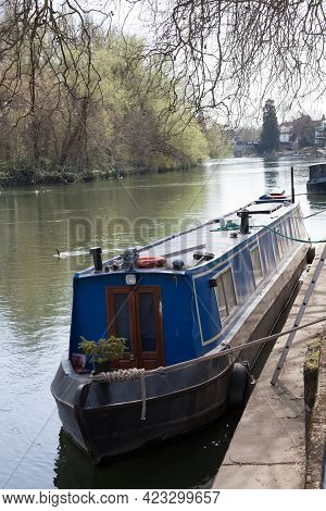 A Narrowboat Moored Along The Thames River In Maidenhead In The Uk, Taken On The 30th March 2021
