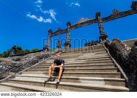 Male Tourist In Beautiful Architecture Photo Of Khai Dinh Emperor Mausoleum, Hue, Vietnam. Popular V
