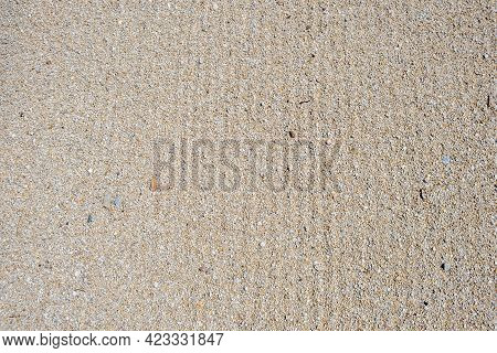 Small Pebbles And Sand Leveled, Background Texture, Top View.