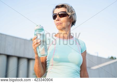 Active Seniors Woman On Fitness Workout In The City