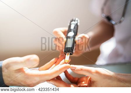 Diabetes Blood Sugar Check For Man By Doctor