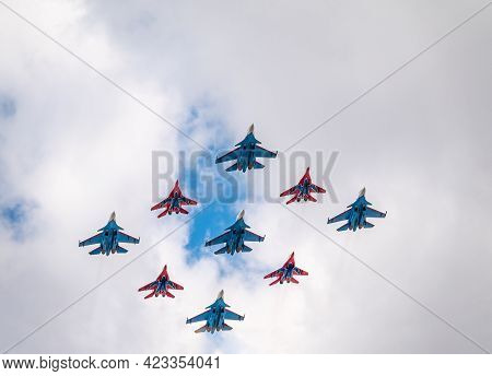 Moscow, Russia - May, 05, 2021: Diamond-shape Of 4 Mig-29 The Russian Knights And 5 Su-27 Swifts In 
