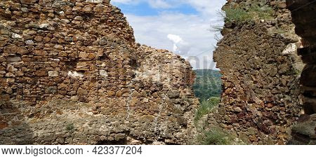 Ruins Of An Old Fortress In Vrdnik, Sremska Mitrovica, Vojvodina, Serbia. Ancient Stone Walls With M