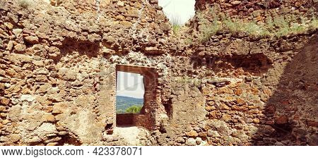 Ruins Of An Old Fortress In Vrdnik, Sremska Mitrovica, Vojvodina, Serbia. Ancient Stone Walls With M