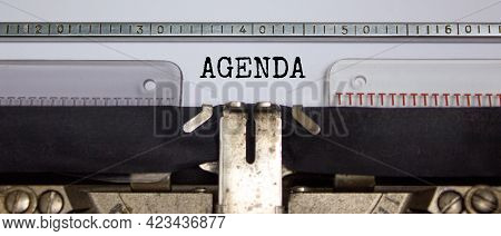 Business And Agenda Symbol. The Concept Word 'agenda' Typed On Retro Typewriter. Beautiful White Bac