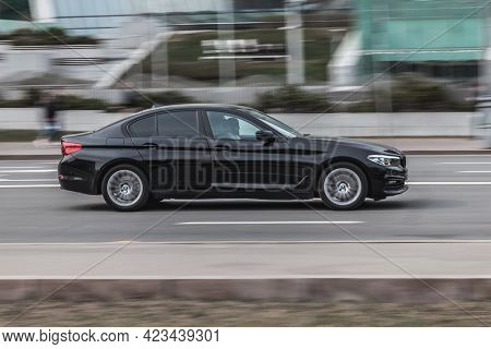 Moscow , Russia - April 2021: Side View Of Bmw 5 Series G30, Which Is Driving On Streets Of City Cen
