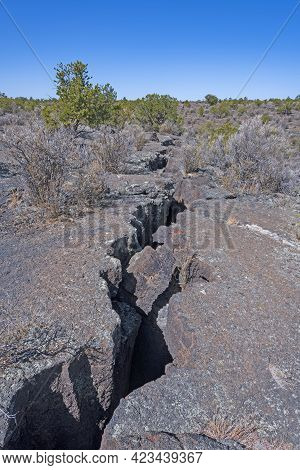Major Fissure In A Lava Field In El Malpais National Monument In New Mexico
