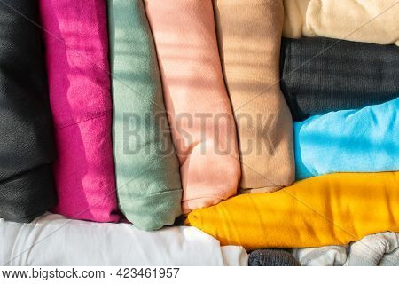 Close Up Of A Group Of Colorful T-shirt Pack And Arranging In Suitcase, Prepare For Travel. A T-shir