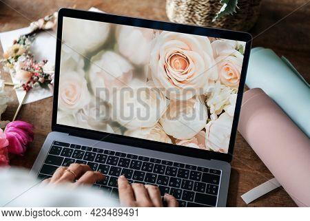 Florist using a floral laptop screen mockup