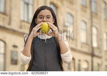 Little Kid In School Uniform Bite Natural Apple Outdoors, Healthy Eating