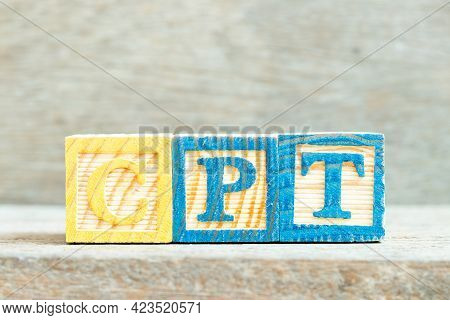 Color Alphabet Letter Block In Word Cpt (abbreviation Of Carriage Paid To) On Wood Background