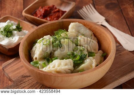 Homemade Dumplings, Dagestan Cuisine, Kurze. Dumplings Kurze With Meet Filling, And Adjika Hot Sauce