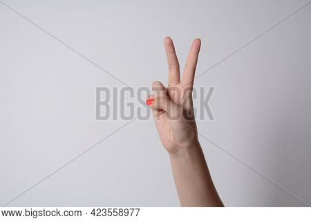 Woman Raising Two Fingers Up On Hand It Is Shows Peace Strength Fight Or Victory Symbol And Letter V