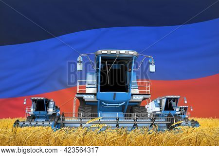Industrial 3d Illustration Of Four Light Blue Combine Harvesters On Rye Field With Flag Background, 