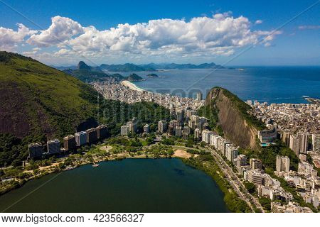 Aerial View Of Rio De Janeiro Landscape, Copacabana, Cantagalo Mountain, And The Ocean