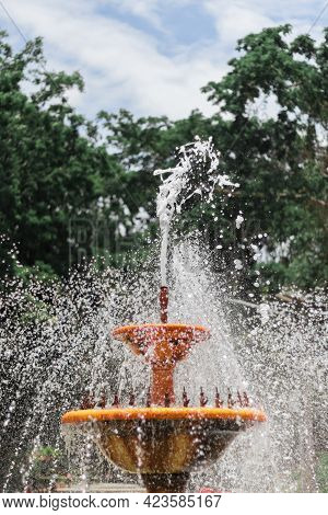Picture Of Stop Action Outdoor Fountain In The Park