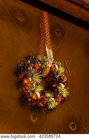 Christmas Door Decoration With Baubles, Pinecones And Pine Needles