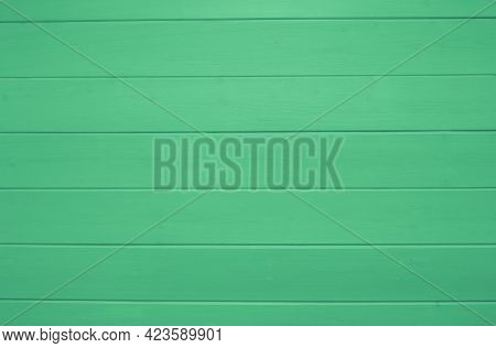 Green Wooden Texture Background. Copy Space. Backdrop. Wood Finish Material Shop Concept. Color Bann